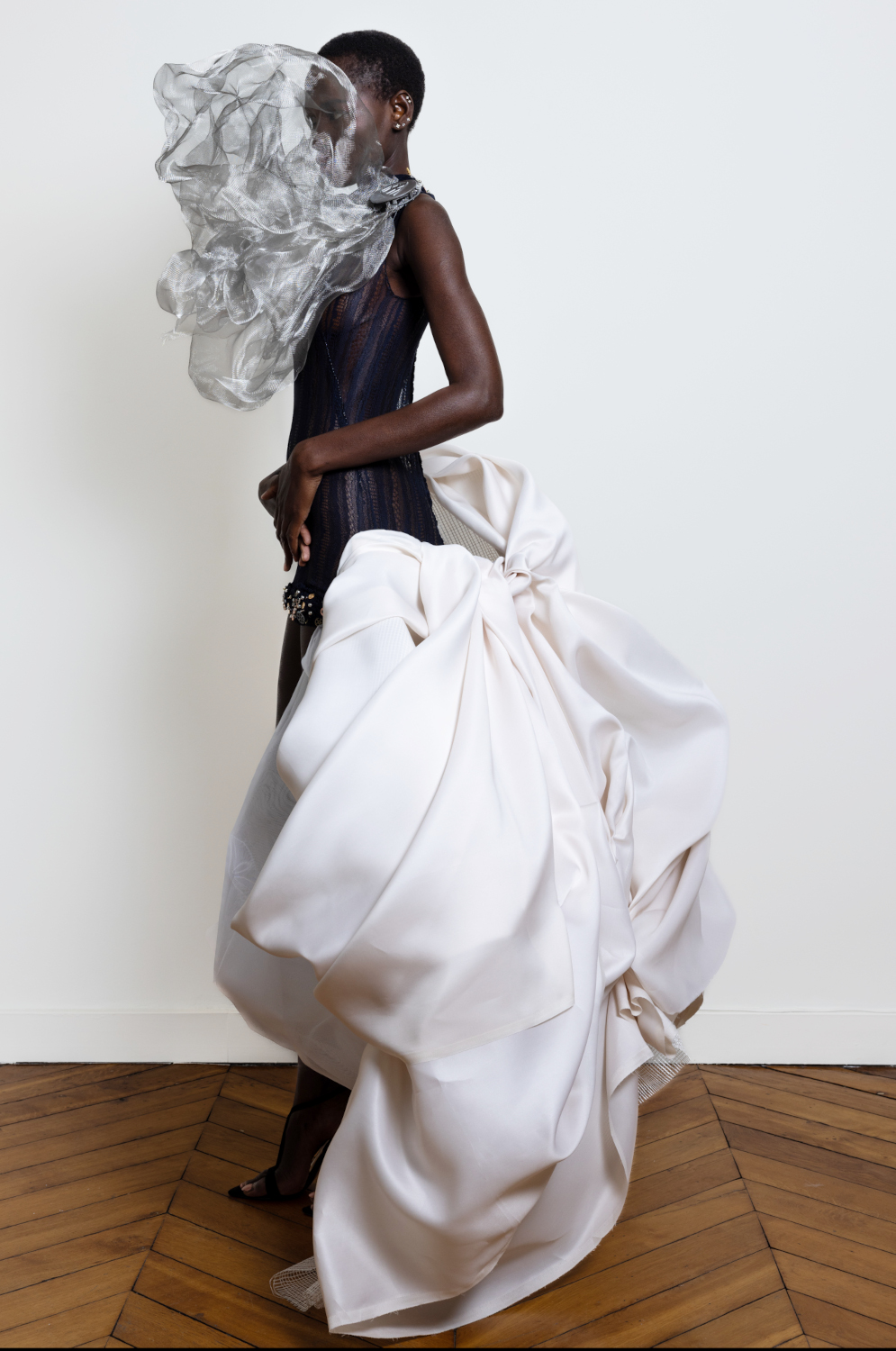 Angelo Fair Main de Maitre Dress Haute Couture Week  in chantilly lace in navy and silk gazar in white surrounded by  silver steel mesh